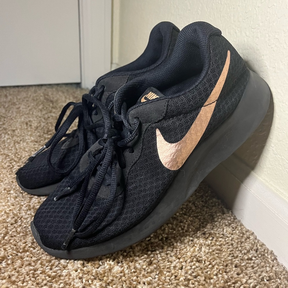 Rose Gold Nike tennis shoes
